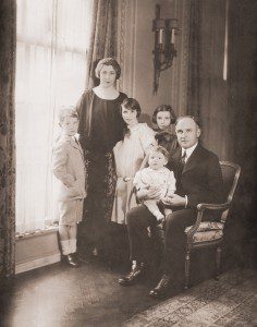 Alvan T. Fuller’s winter home in Boston in 1924. From left to right, Persh Fuller, Viola Fuller, Lydia Fuller, Mary (Dikki) Fuller, ATF with Peter Fuller on his lap.